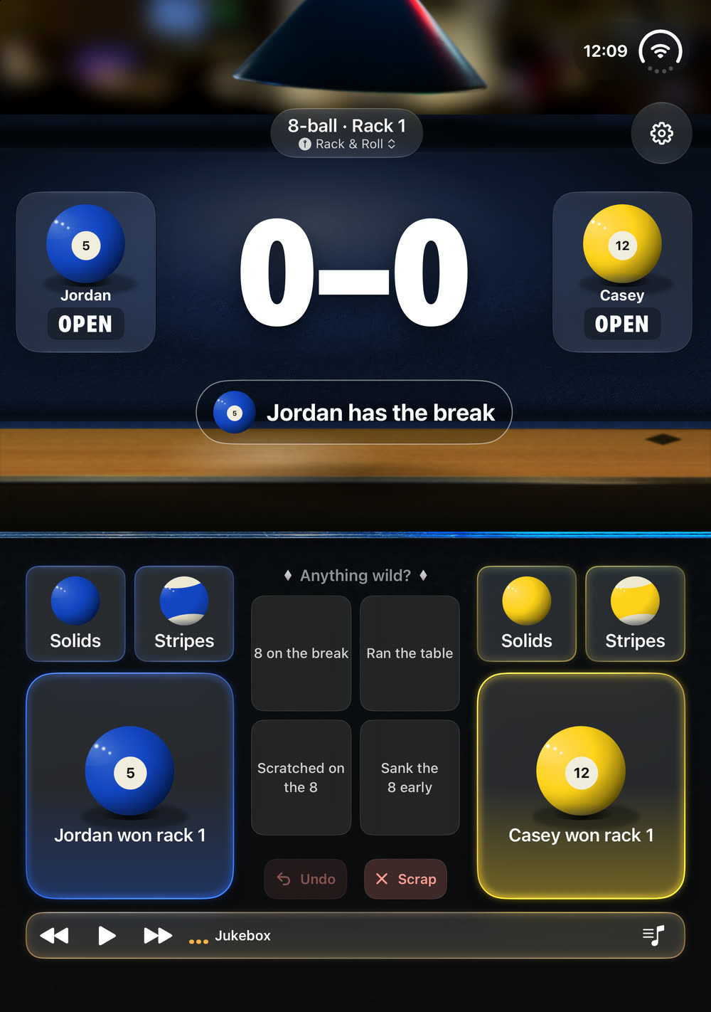 The Duo half open like a laptop: the score on the top half, the buttons on the bottom half