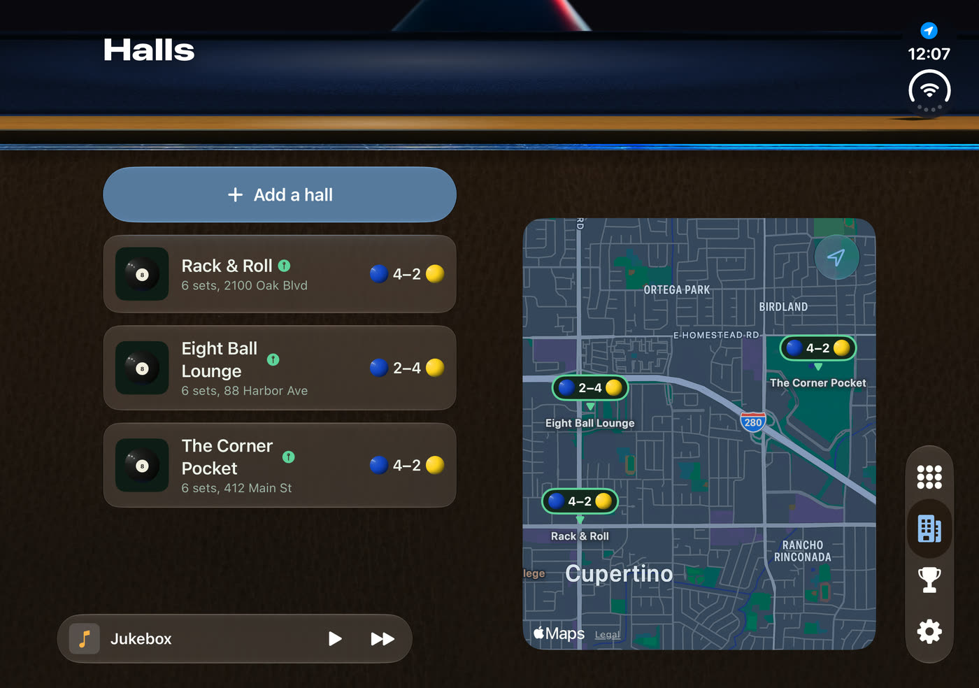Halls on an iPhone Duo opened flat: three halls with their records beside a map of where they are
