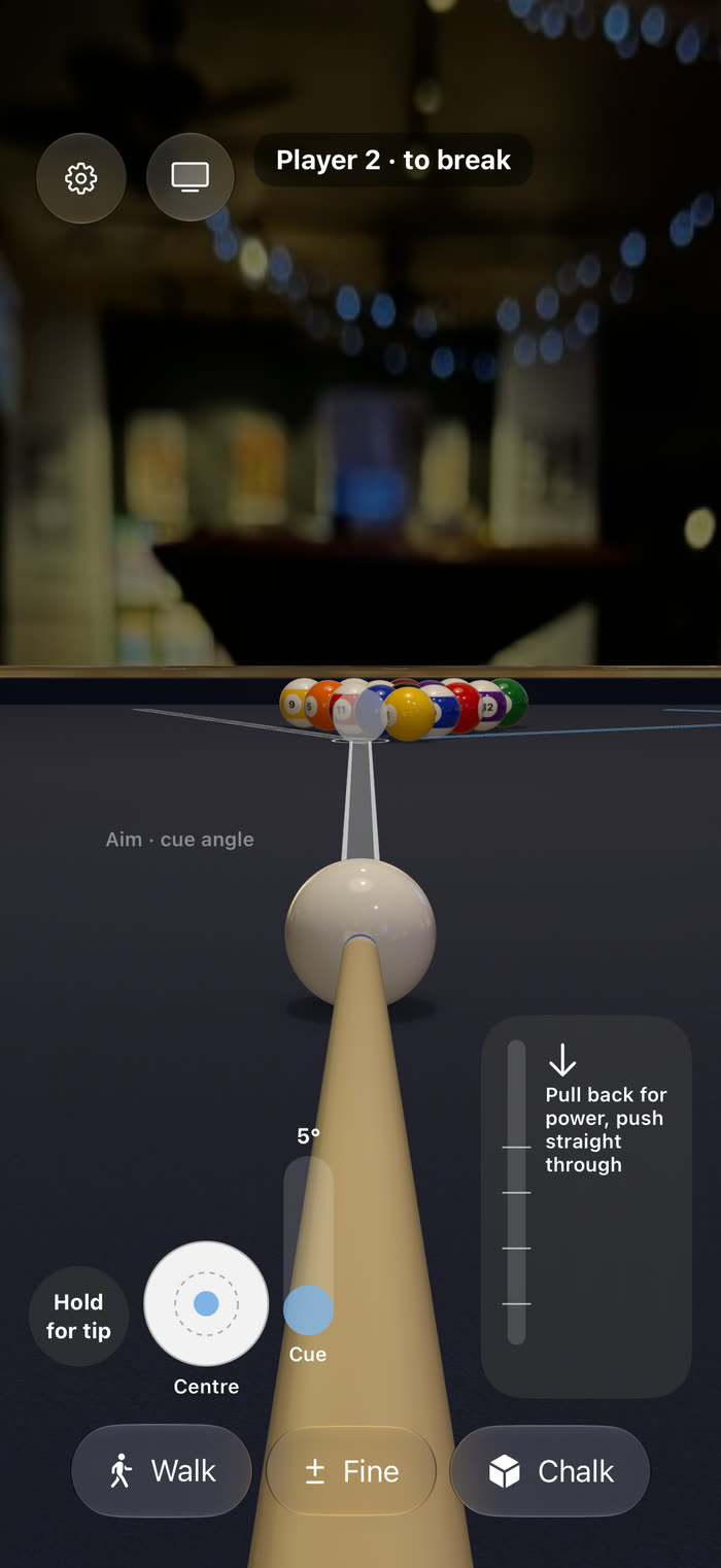 The pool game on iPhone: looking down the cue at the racked balls, with a spin pad and a stroke pad